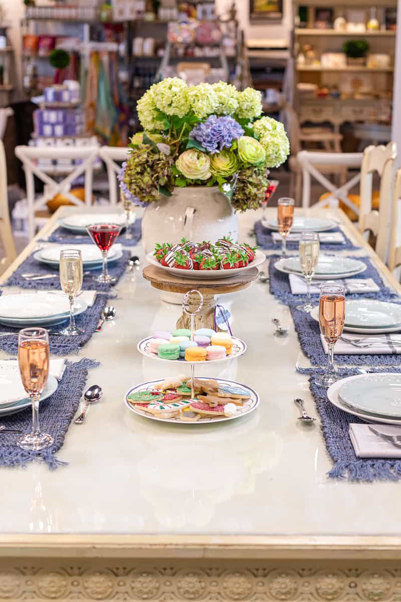 french country formal table setting with desserts